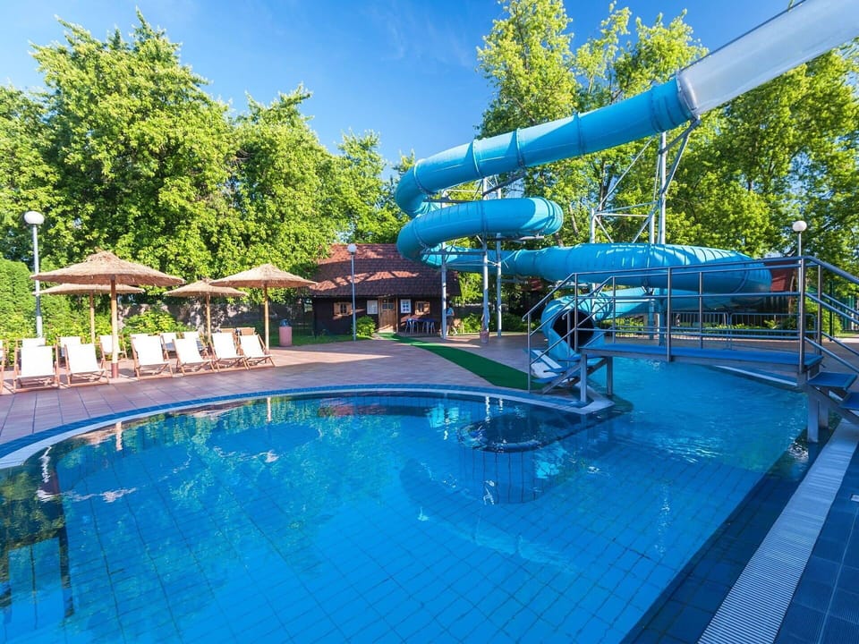 Water, Sky, Property, Swimming Pool, Azure, Shade, Building, Tree, Leisure, Real Estate