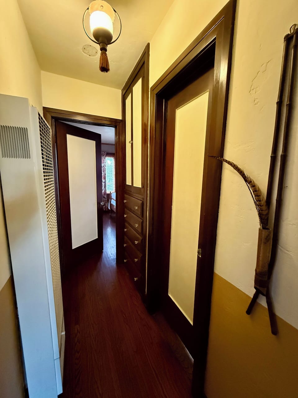 Hallway from guest room to primary bedroom