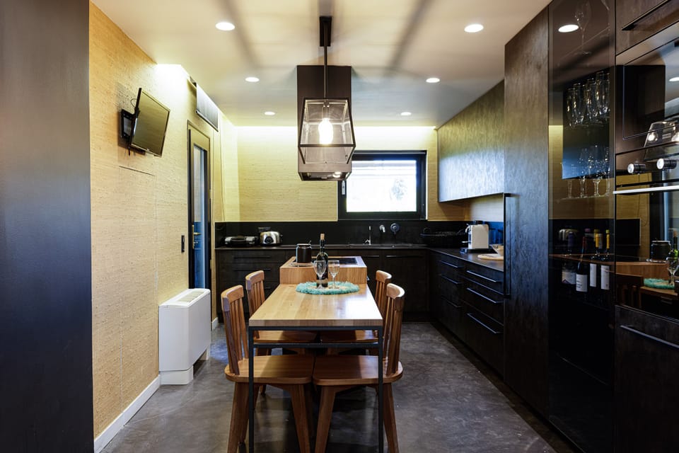 A fully equipped kitchen awaits to inspire you for culinary wonders 