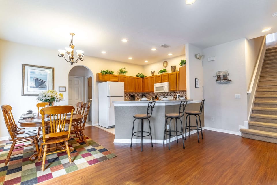 Enjoy the dining area along with a breakfast bar at the kitchen counter.