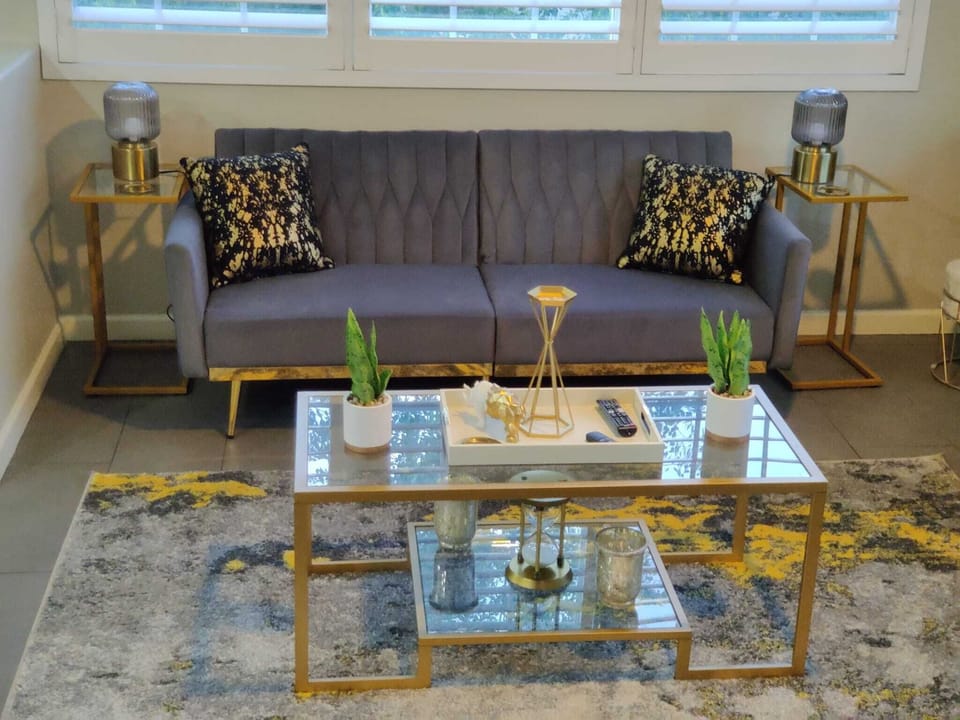 Living room with Fire pit to help you relax convertible couch