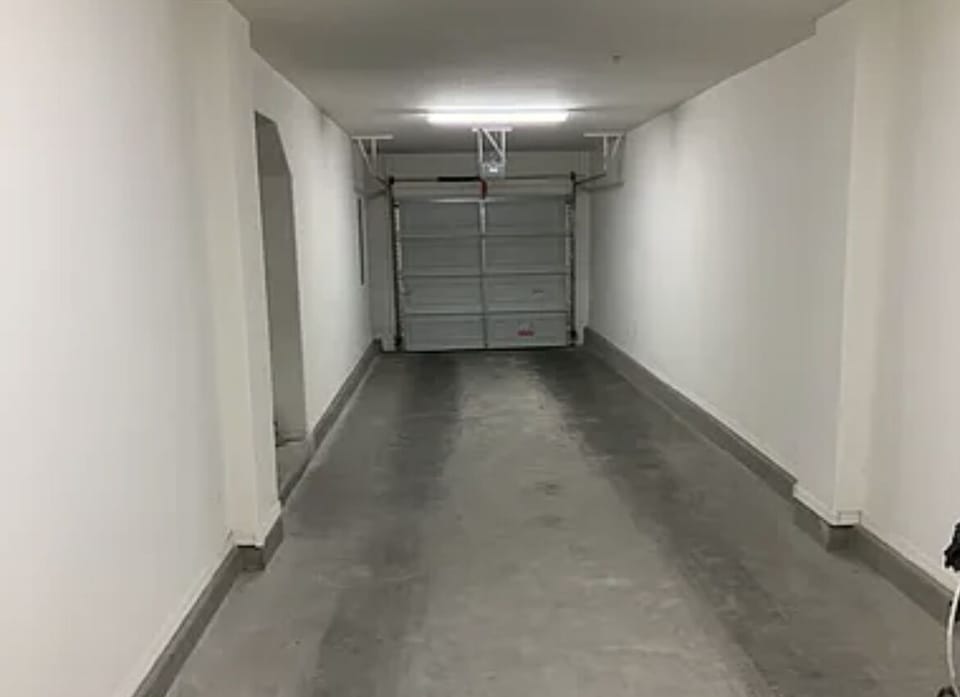 Tandem two car garage with full size washer and dryer for your convenience 