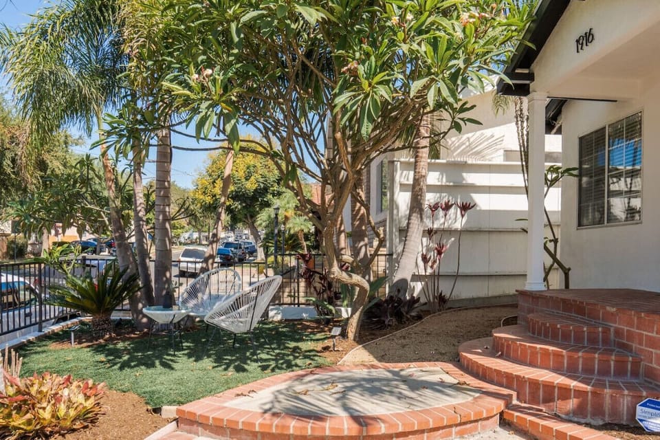 Experience the ultimate in curb appeal with this beautifully designed front yard