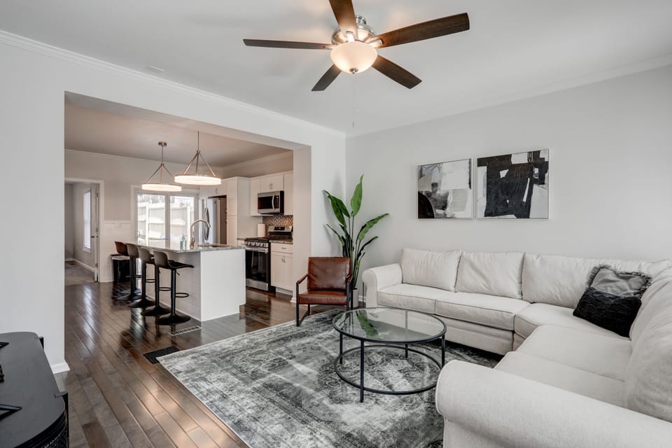 Relax on the comfy sectional sofa after a long day of exploring Lancaster city!