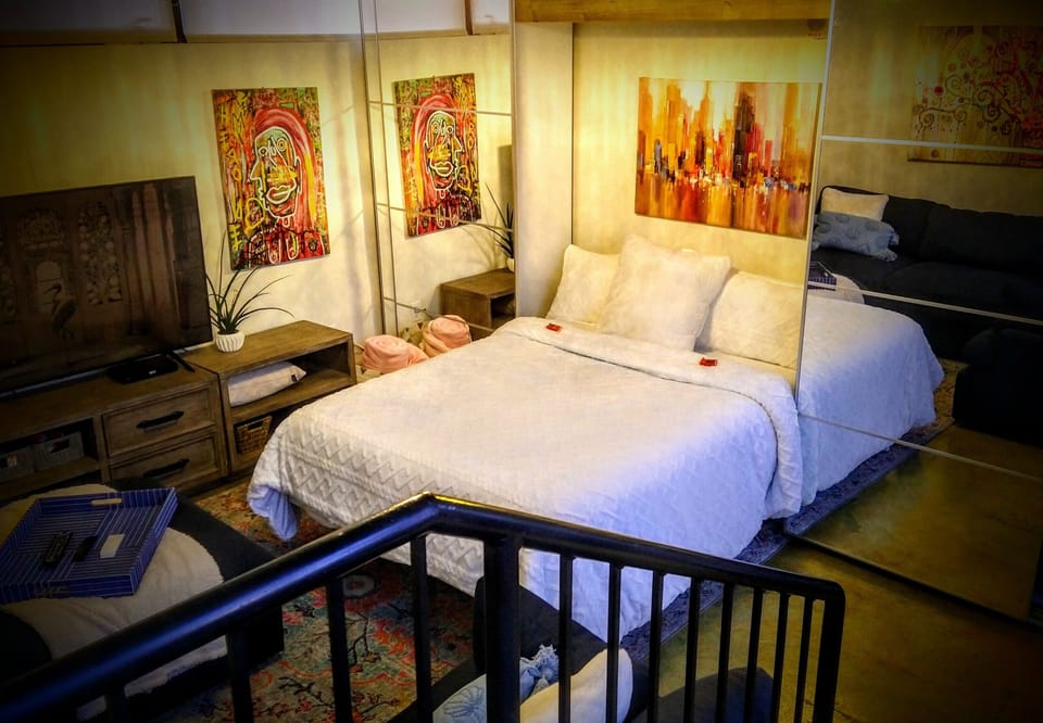 Loft room with Murphy bed down. 