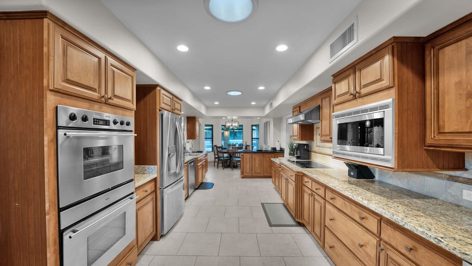 Gather and create in our expansive chef's kitchen with premium appliances.