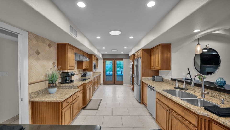 Your culinary adventures await in this fully equipped, bright chef's kitchen.