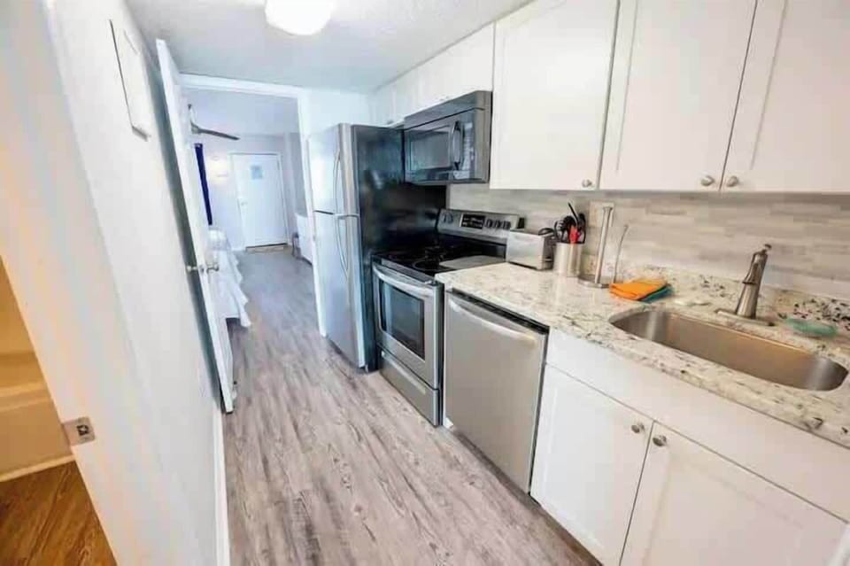 Well-equipped kitchen - with everything you need to cook, reheat, or brew a cup of coffee: