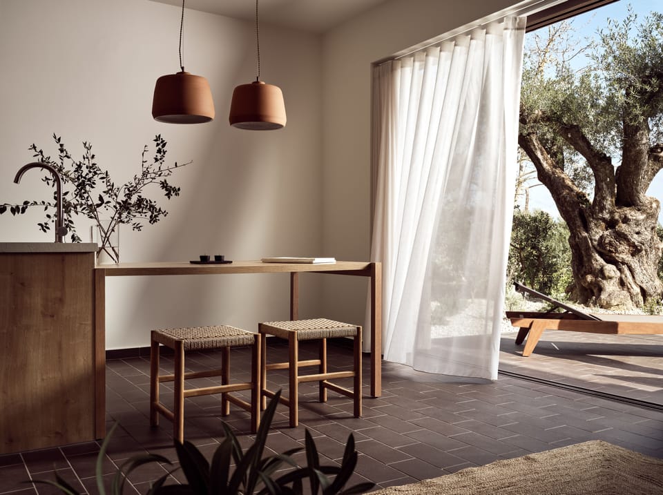 Be whisked away into a world of earthy extravagance, featuring a living room