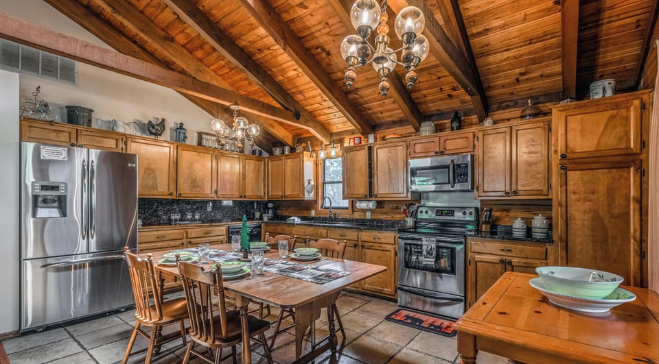 Living room opens to fully stocked kitchen