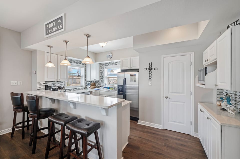 Island retreat kitchen stocked with everything you need for dining in.