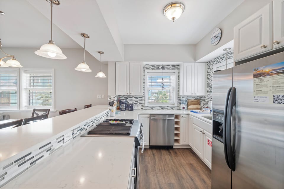 Fully equipped vacation rental kitchen with stainless steel appliances.