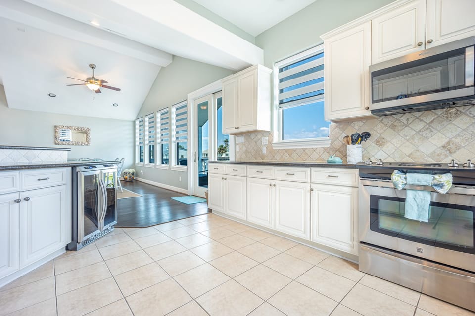 This kitchen has plenty of room for all the cooks in your party.