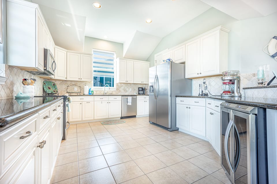 Enjoy a kitchen with everything you need to entertain including a wine fridge.