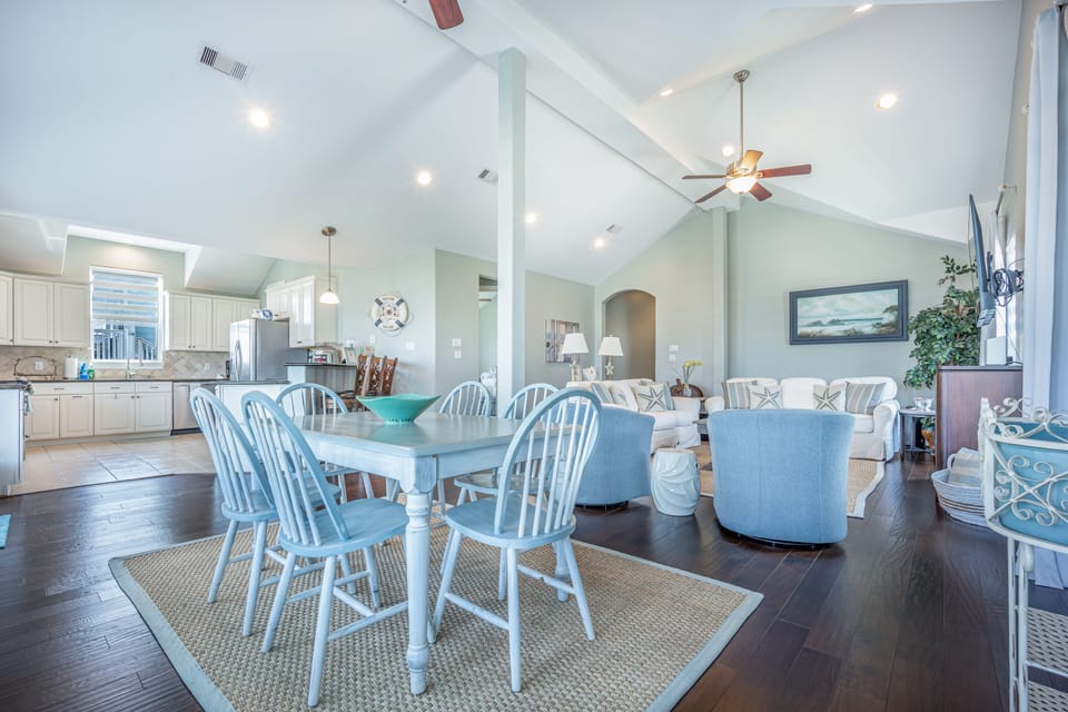 Enjoy the open concept living, dining, and kitchen.