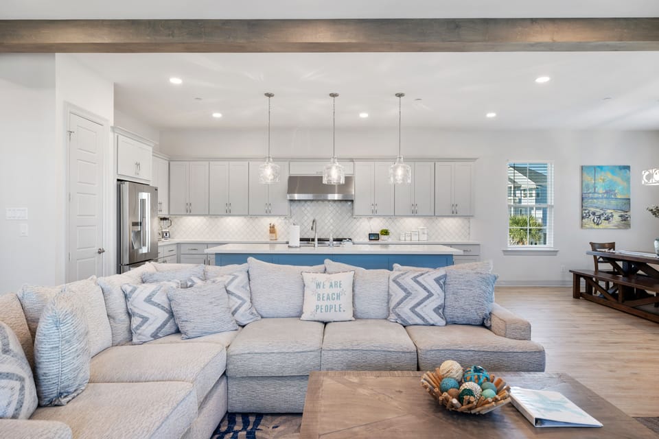 Open concept family room, kitchen, and dining room.