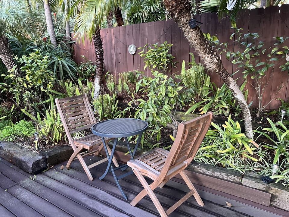 Backyard table with narrower view of ocean. 