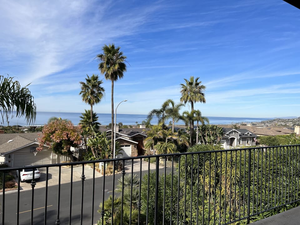 View from second floor balcony which is off en-suite bedroom/sunroom with king.