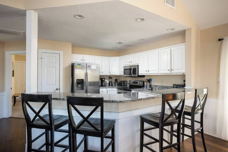 Top Level: Kitchen with Breakfast Bar and Fully Stocked Amenities