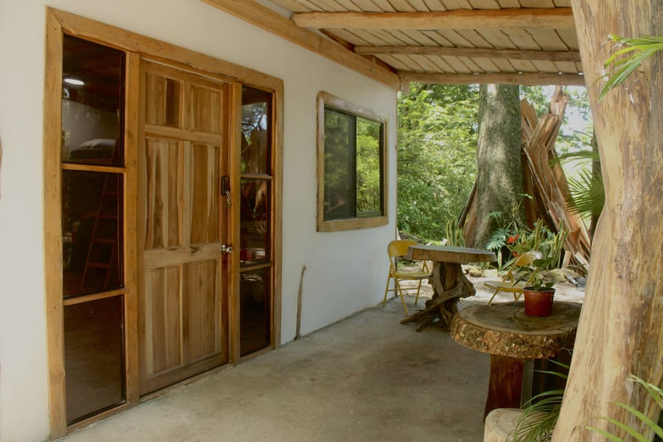 The front porch includes a hammock where you can relax and watch hummingbirds.