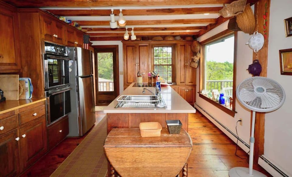 Full kitchen with new fridge, dishwasher and ceramic stovetop
