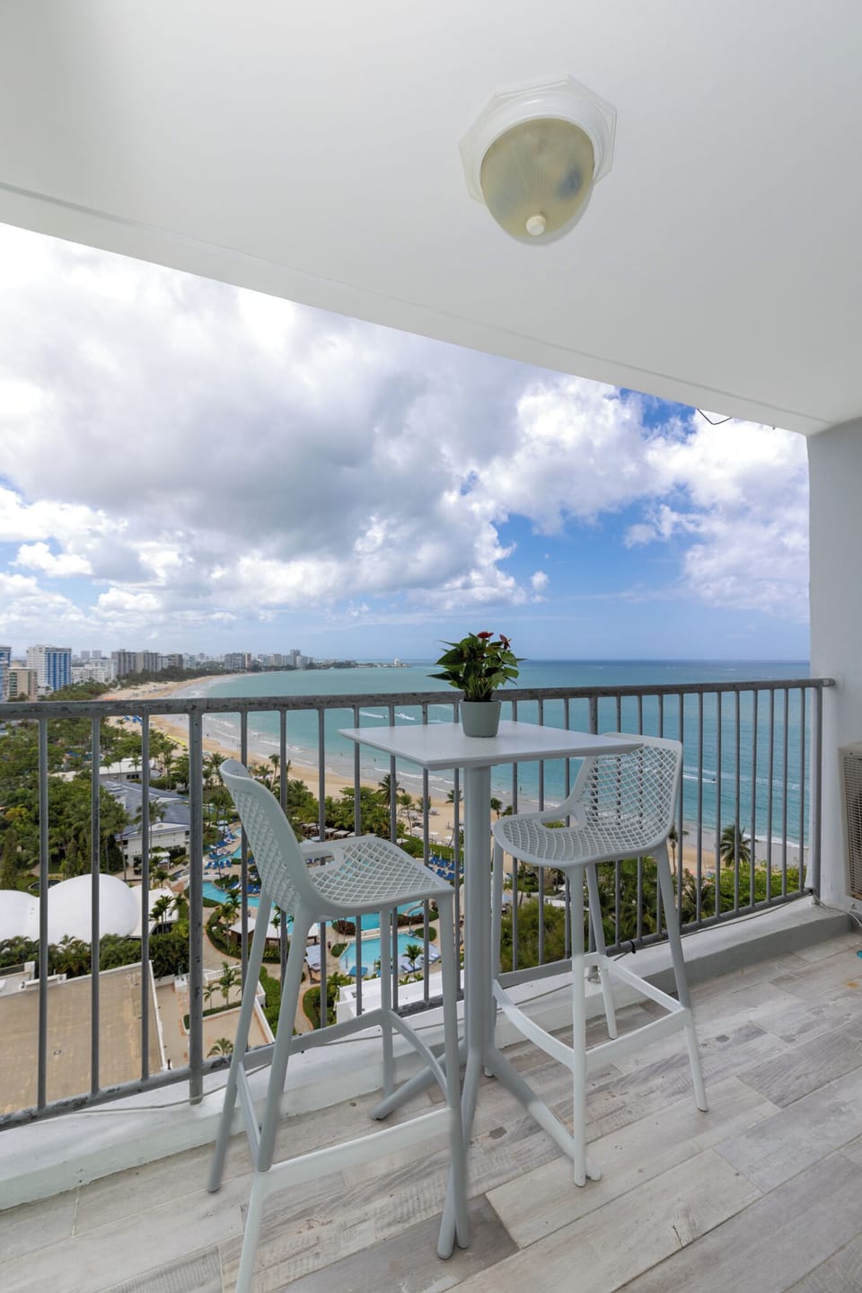 Enjoy a glass of wine or a cup of coffee while taking in the gorgeous beach view