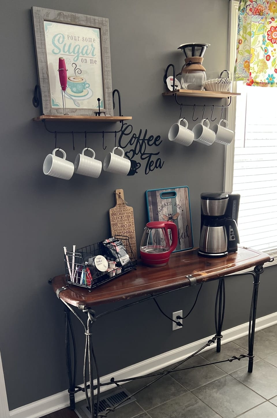 Complementary coffee and tea bar.  This is an antique table we found locally.