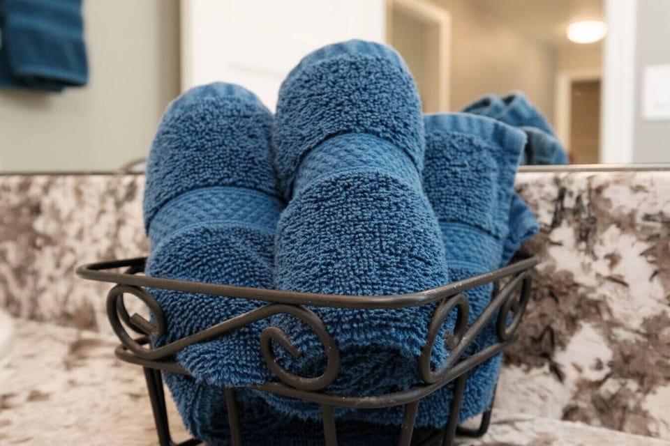 Fresh towels are ready for your stay.