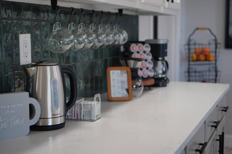 Now this is what a coffee bar should look like! We provide a starter supply of k cups and ground coffee, lots of teas and a fun ways to make unique festive drinks for all seasons. 