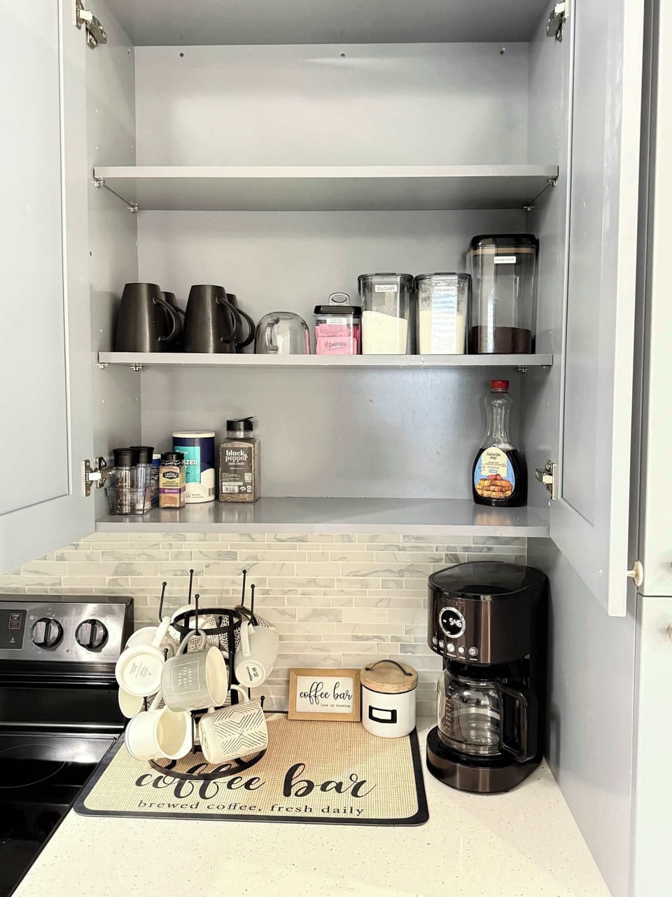 Coffee Bar with Coffee, Creamer and Sugar.