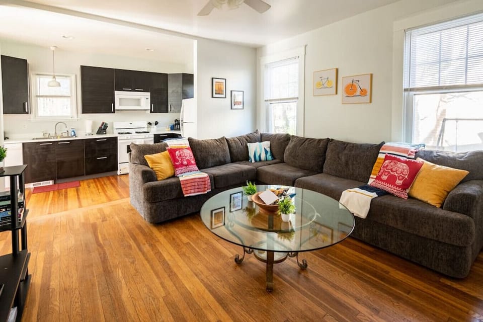 Kick back on the sectional sofa and enjoy your favs on the flat-screen Roku TV! A large coffee table is perfect for game nights, with fun décor, wood-paneled floors, and a ceiling fan for extra comfort. Books, games, and complimentary snacks await!