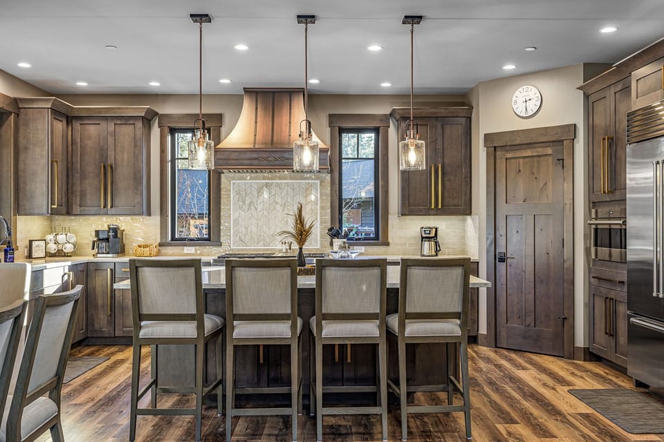 Massive kitchen island with seating for 6 — the social hub of the home