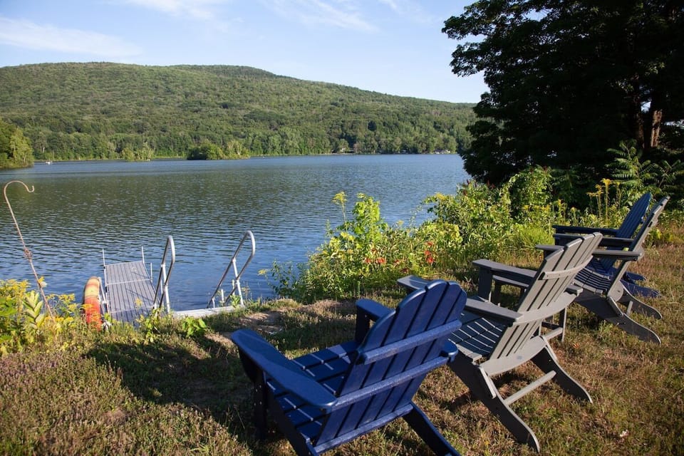 Adirondack chairs by the lake