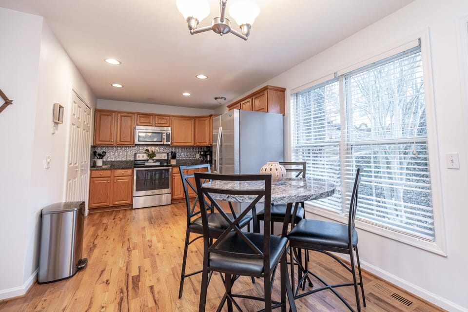 Full kitchen located on main floor. Washer and Dryer also located behind doors. 