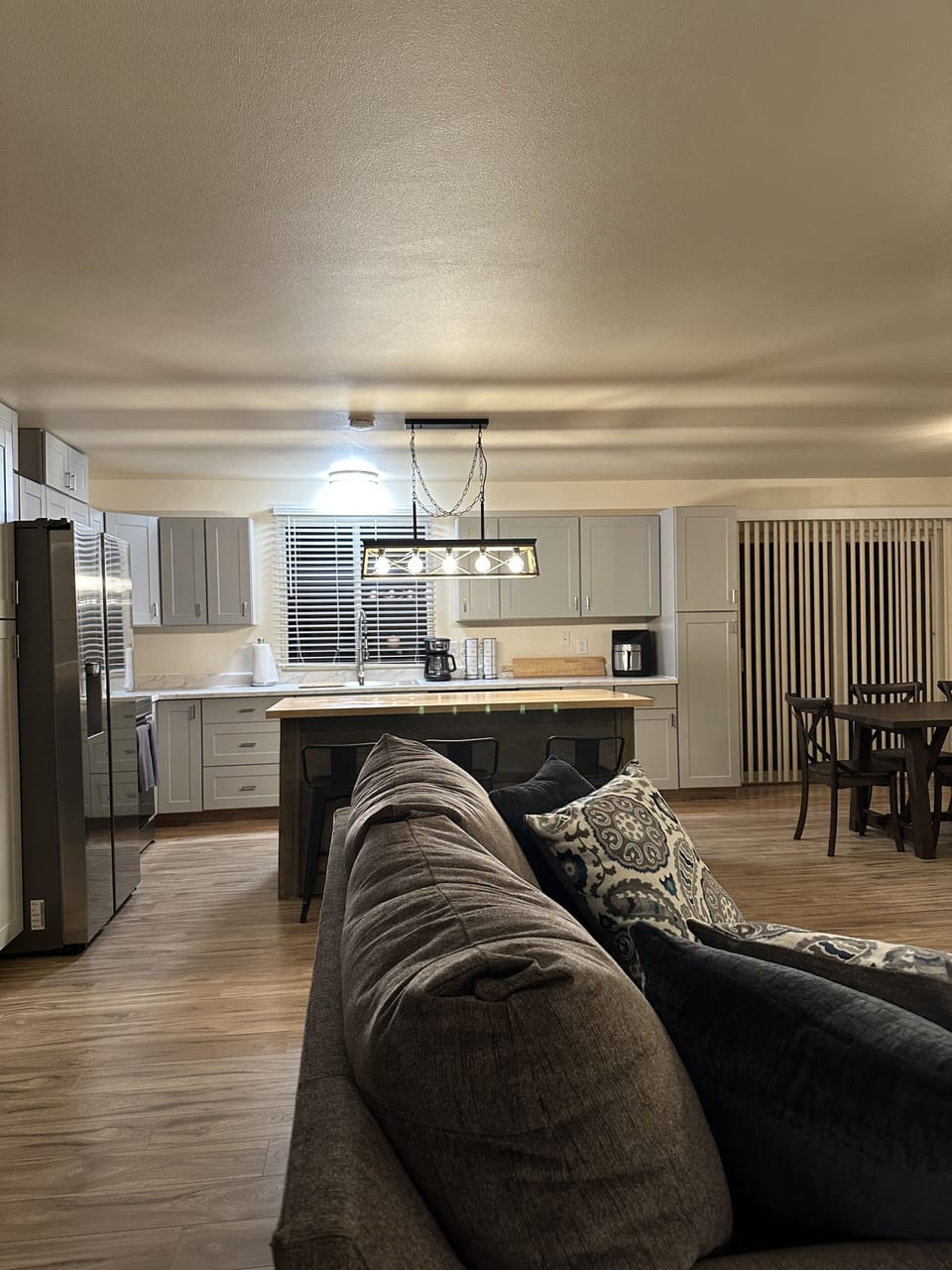 Large open kitchen with butcher block island 
