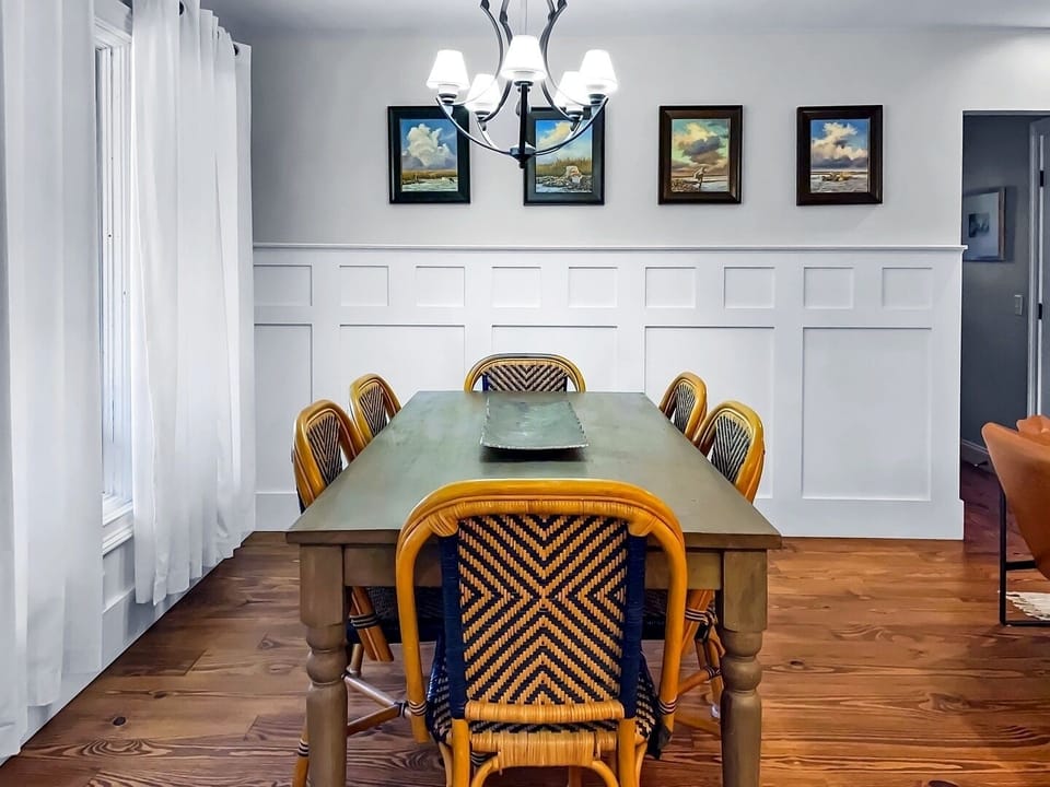 Gather around this elegant dining table where memorable meals and conversations await in your refined home away from home.