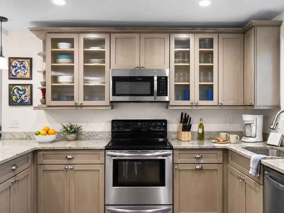Your fully equipped kitchen awaits with granite countertops, stainless appliances, and ample cabinet space for all your culinary adventures.