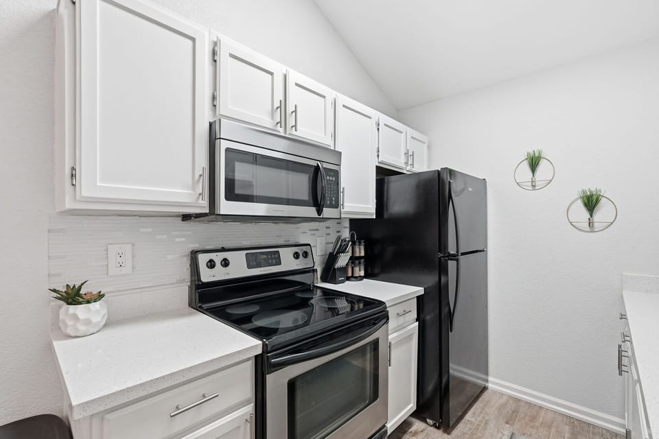 Modern appliances, ample counter space, plenty of dishware and more.