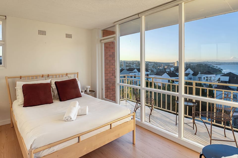 Queen size bed with private balcony