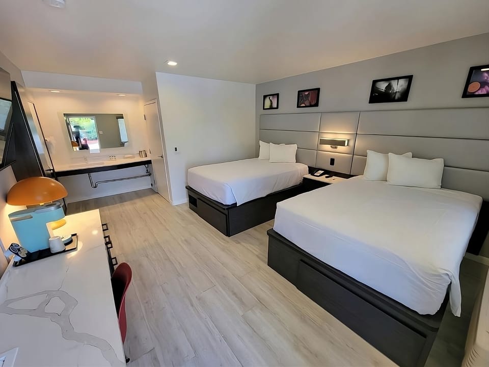 Relax together with two plush beds and a calming space.
