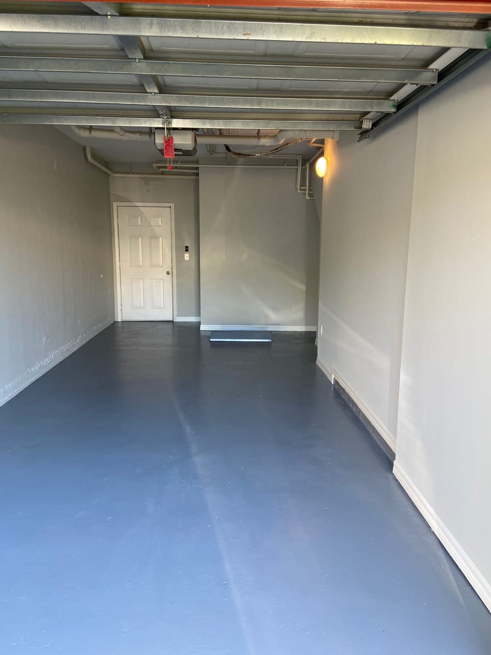 One car garage with remote opener.  Garage is attached to the unit.
