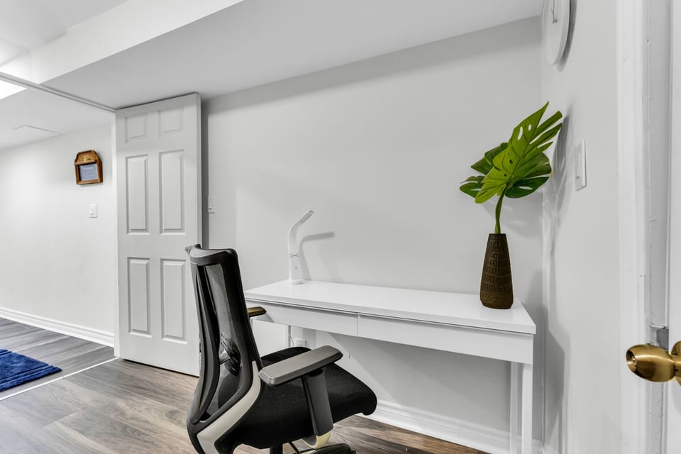 office space with lamp and ergonomic chair
