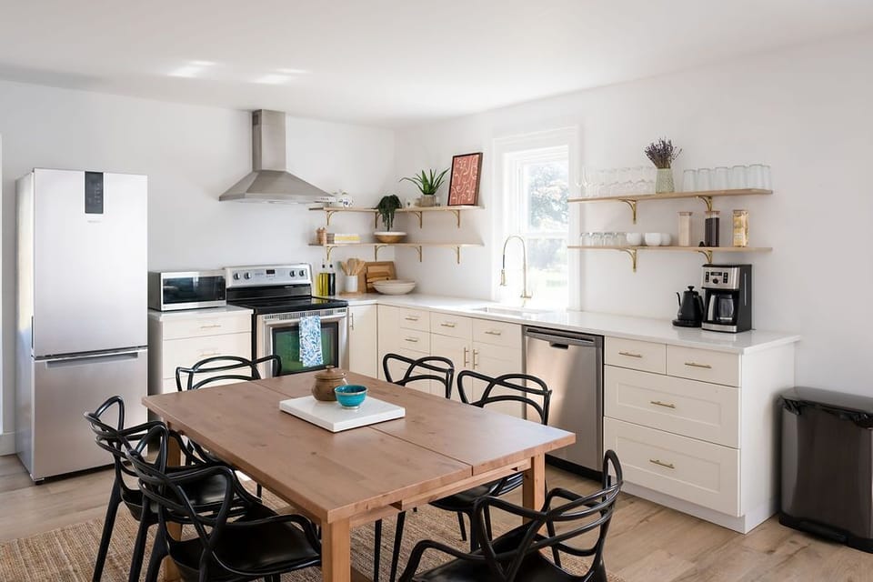 A nice big table for you to eat at (or work if you need to). The table extends on each end to become even larger.