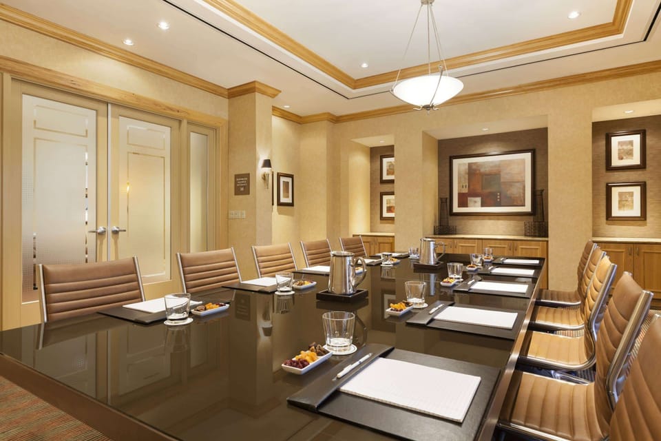 Gather for relaxed meals in the warm, wood-floored dining room.