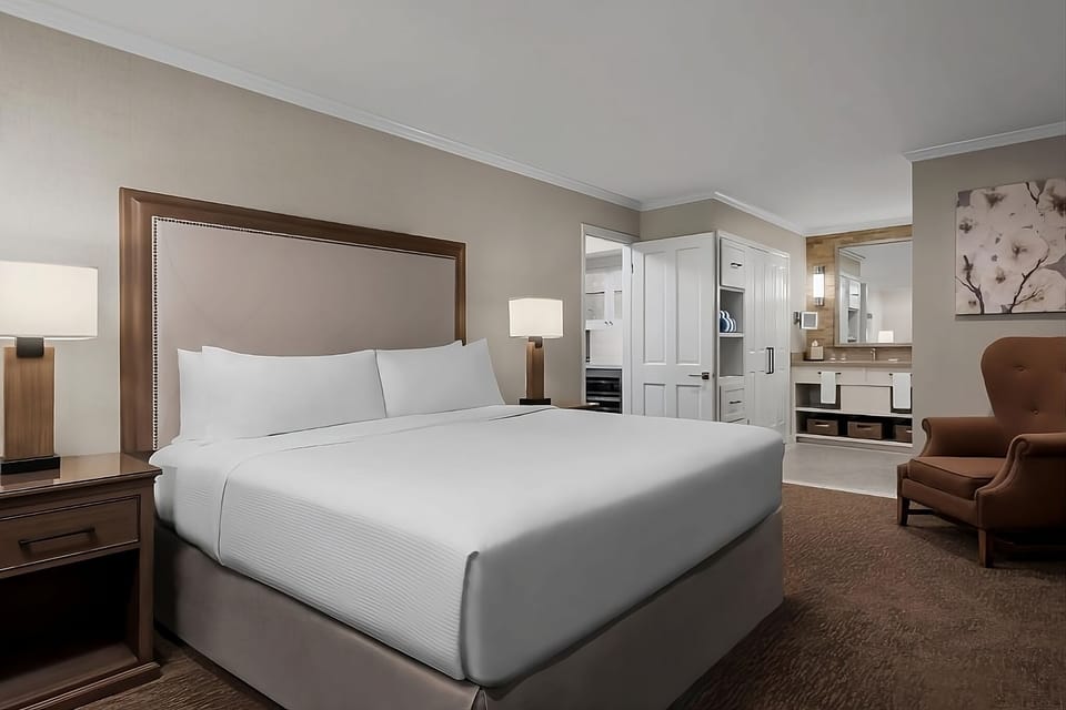Unwind into crisp linens with a calm, spacious layout.
