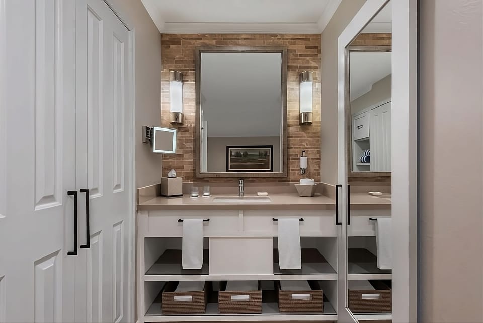 Refresh at the bright double vanity with generous storage.