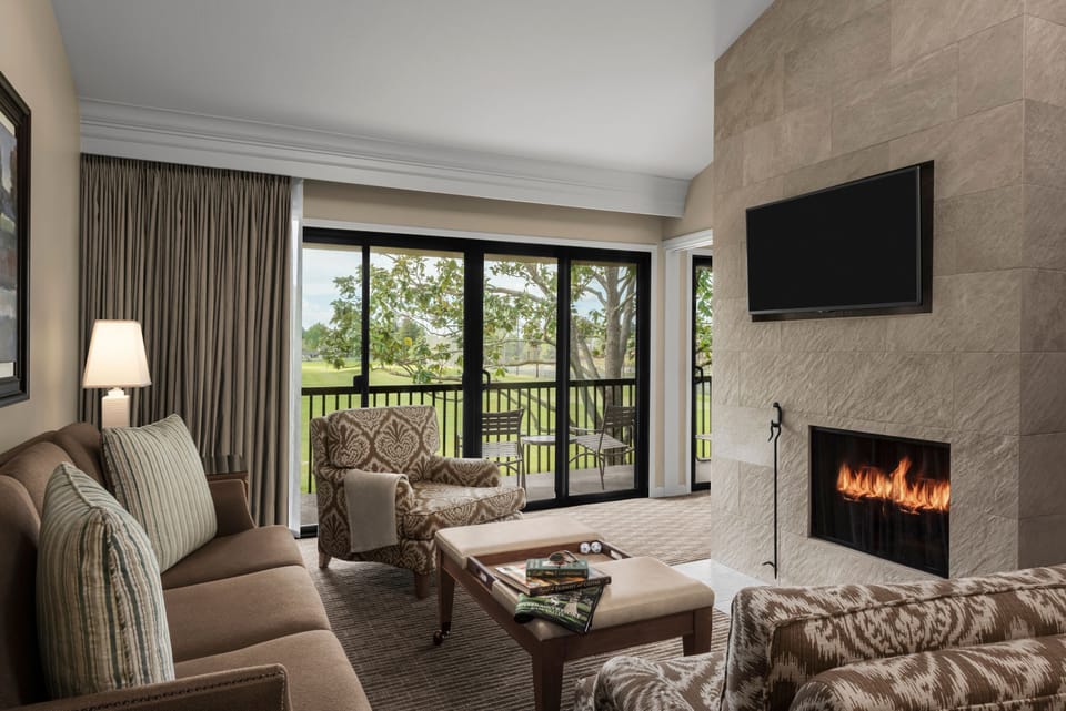 Gather by the fireplace and sip wine on the balcony.