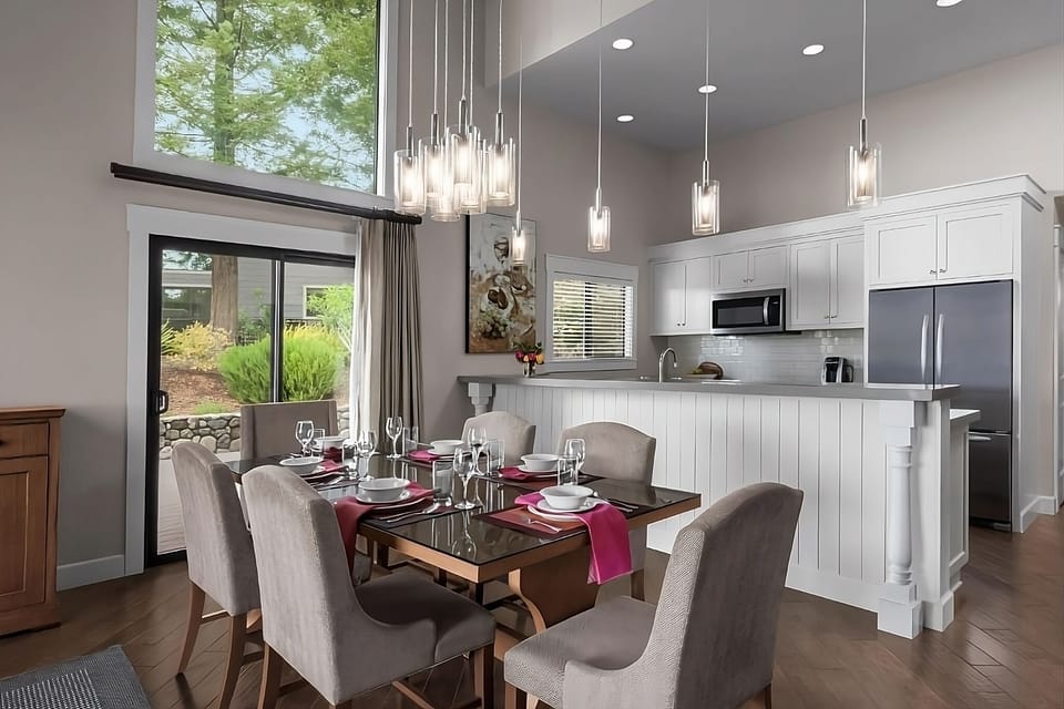 Host effortless meals in the bright kitchen and dining area.