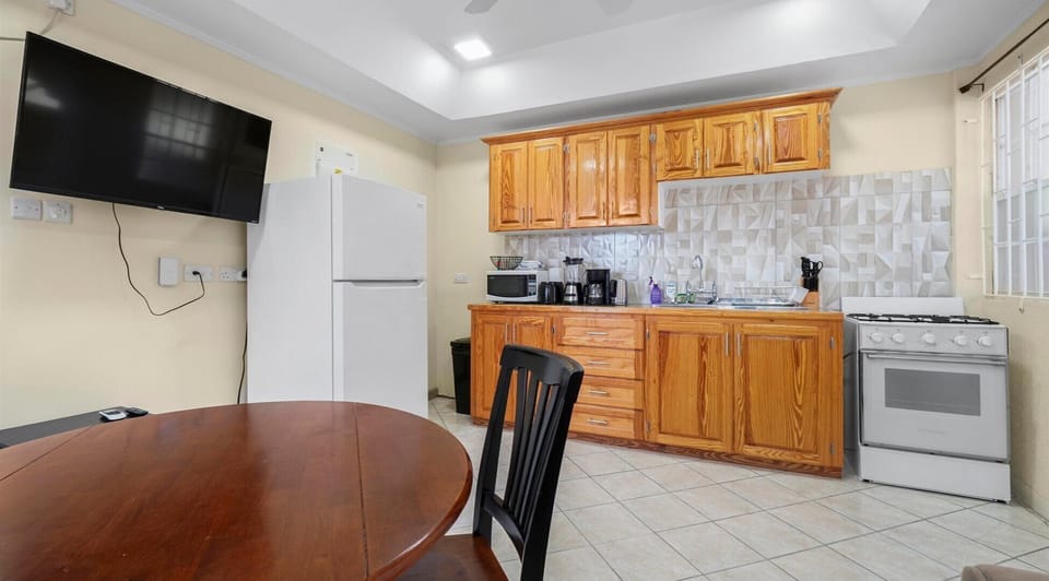 Dining & Kitchen area with view of smart TV