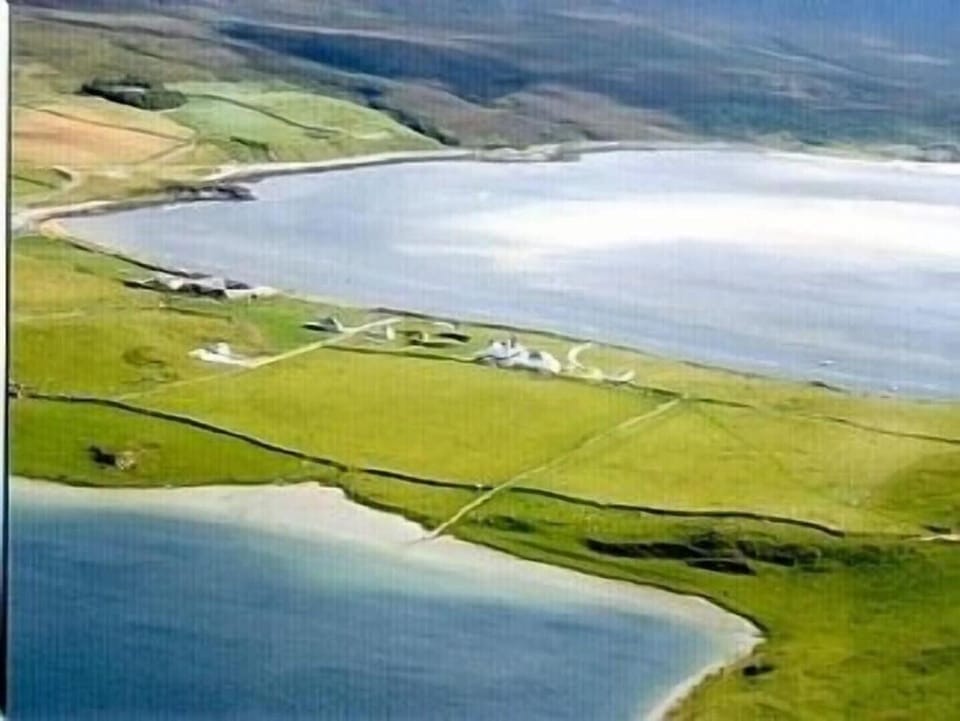 Full tide in Kyle also Loch Boralie and Houses 